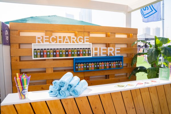 Athletes at Urban Juice hydration station